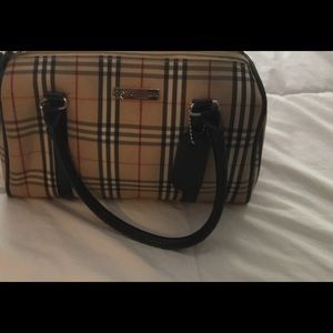 Burberry and Fendi handbags.